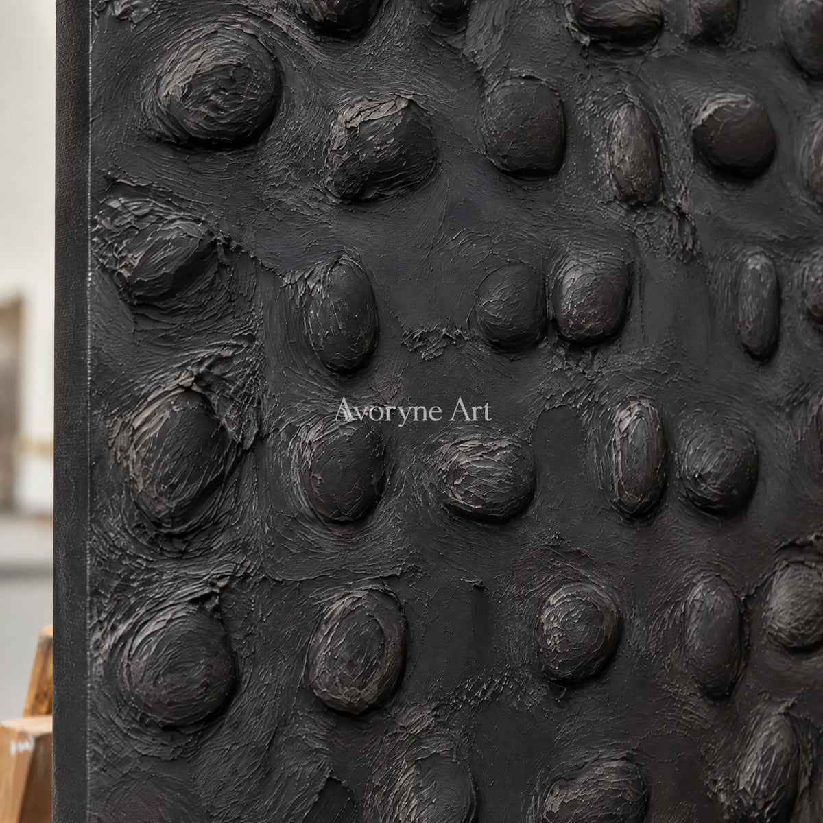 Nocturne Pebbles: Black Organic Relief Wall Art — detail easel