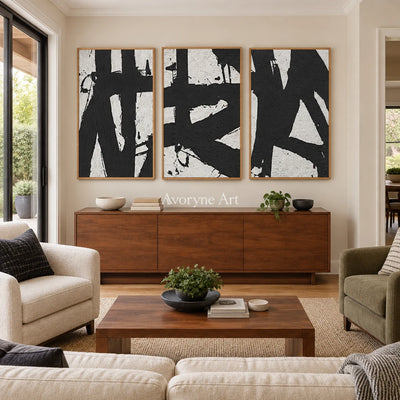 Muted Field black white brushwork triptych with a wood frame in a villa living space