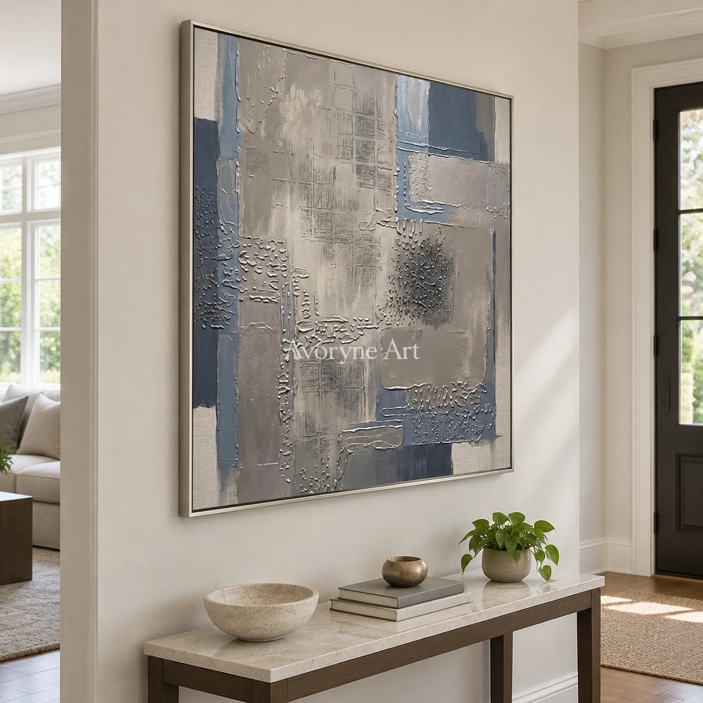 Amber Echo block relief wall art with a silver frame in an entryway