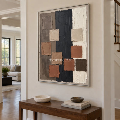 Soft Passage block relief wall art with a silver frame in an entryway