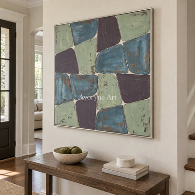 Soft Interval block relief wall art with a silver frame in an entryway