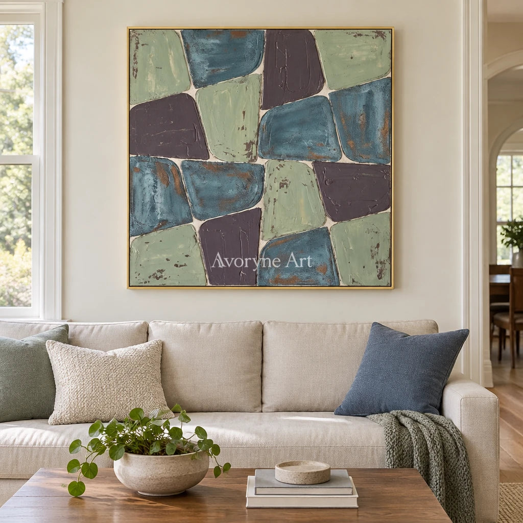 Soft Interval block relief wall art with a gold frame hanging in a living room