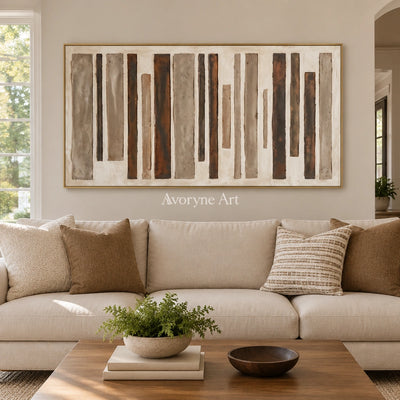 Soft Echo block relief wall art with a gold frame hanging in a living room