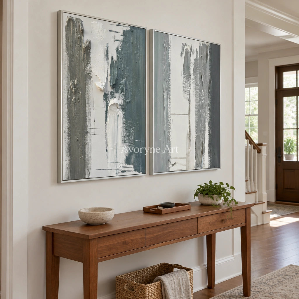 Muted Mosaic blue flow texture diptych with a silver frame in an entryway
