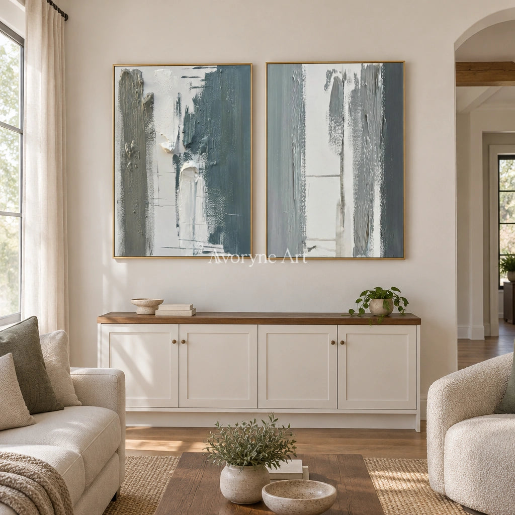 Muted Mosaic blue flow texture diptych with a gold frame hanging in a living room