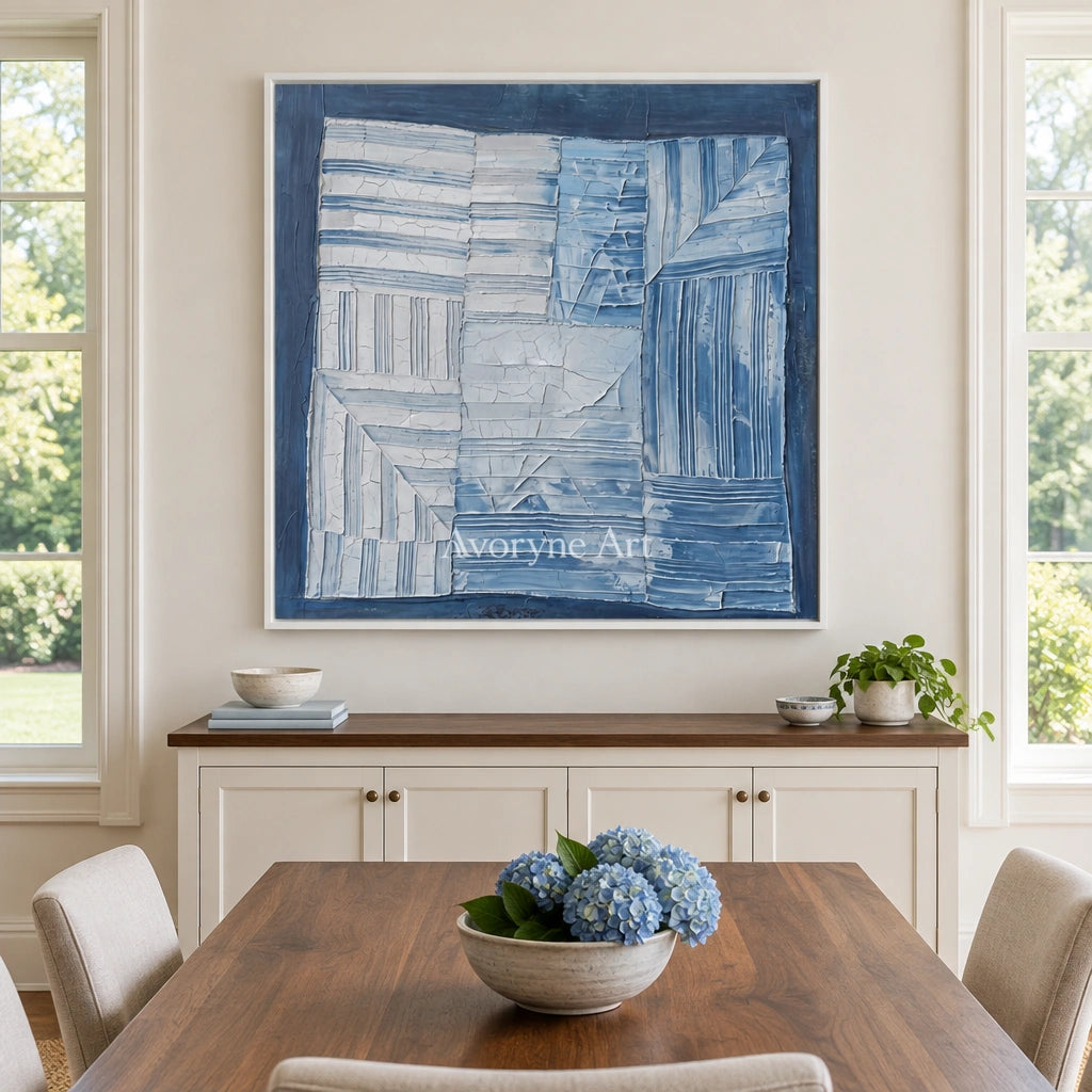 Earthen Solace blue geometric texture wall art with a white frame in a dining room