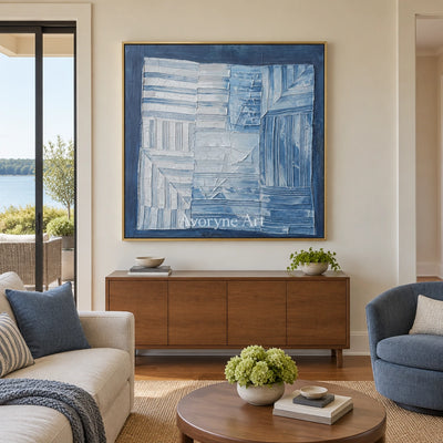 Earthen Solace blue geometric texture wall art with a gold frame hanging in a living room