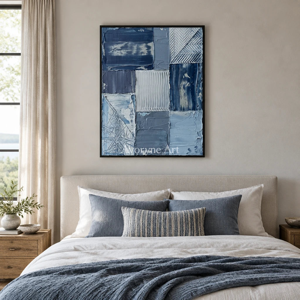 Hushed Measure blue geometric texture wall art with a black frame above a bed in a bedroom