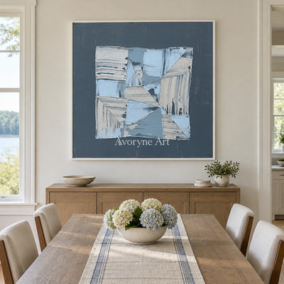 Hushed Rhythm blue geometric texture wall art with a white frame in a dining room