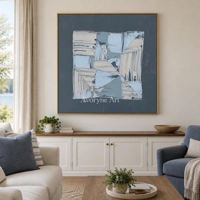 Hushed Rhythm blue geometric texture wall art with a gold frame hanging in a living room