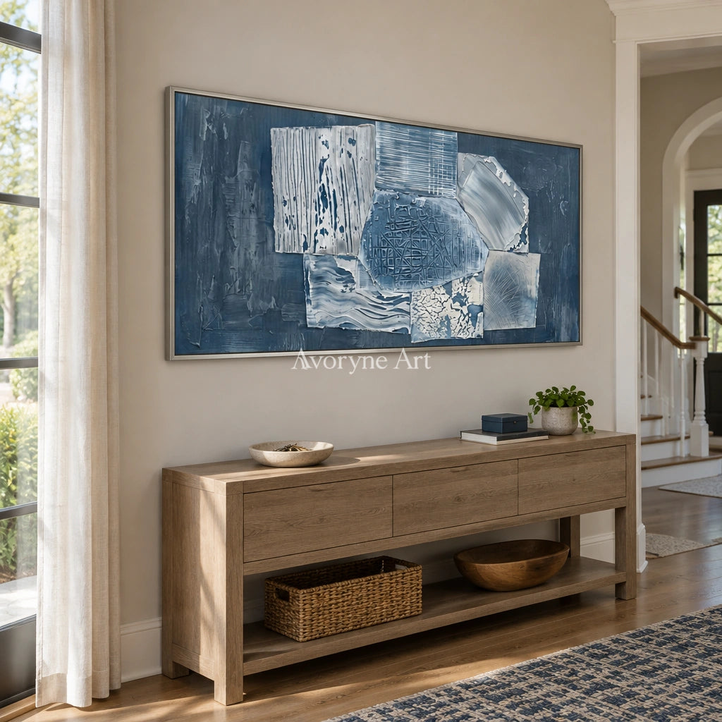 Mineral Passage blue geometric texture wall art with a silver frame in an entryway