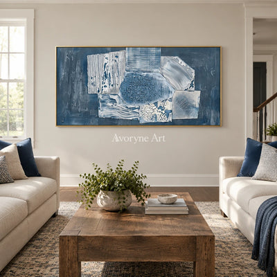 Mineral Passage blue geometric texture wall art with a gold frame hanging in a living room