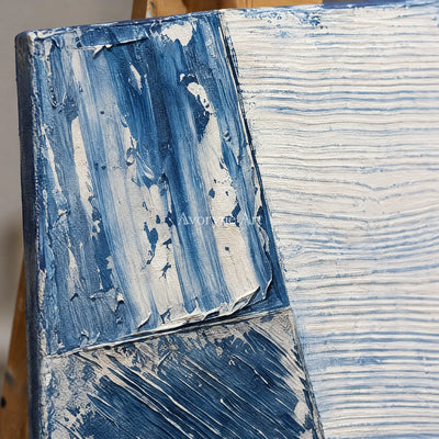 Close-up of the hand-painted texture of Soft Refrain blue geometric texture diptych on an easel