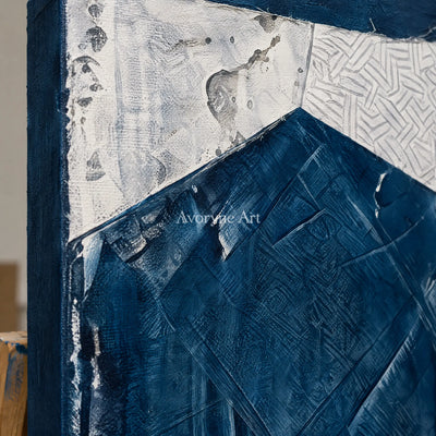 Close-up of the hand-painted texture of Hushed Current blue geometric texture diptych on an easel