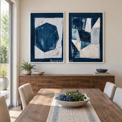 Hushed Current blue geometric texture diptych with a white frame in a dining room