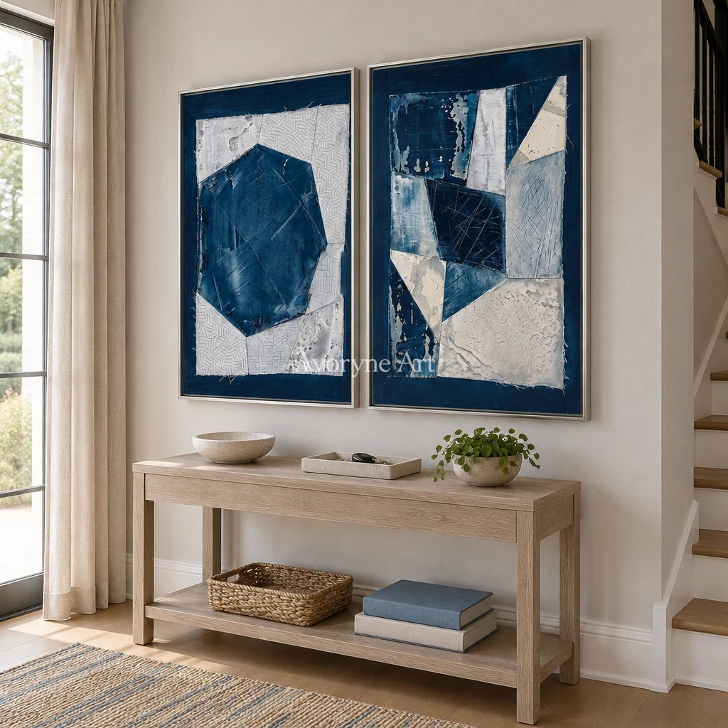Hushed Current blue geometric texture diptych with a silver frame in an entryway