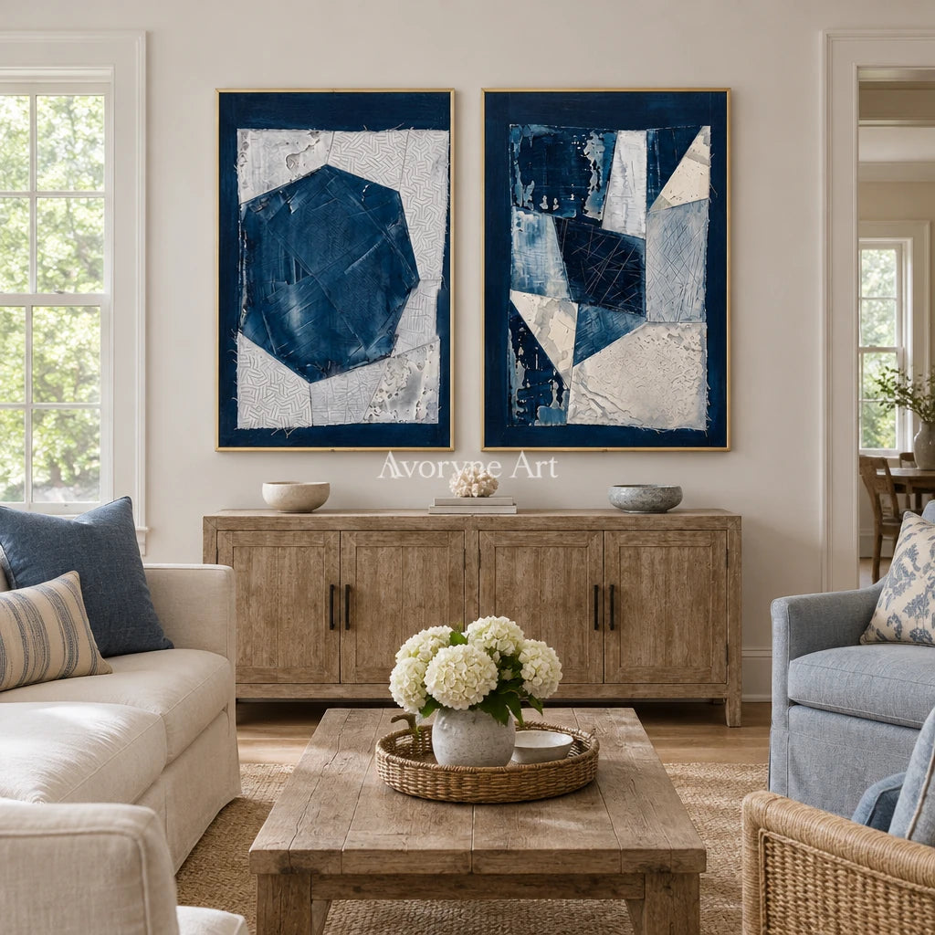 Hushed Current blue geometric texture diptych with a gold frame hanging in a living room