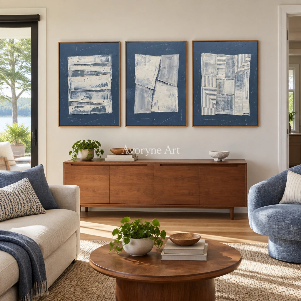 Hushed Solace blue geometric texture triptych with a wood frame in a villa living space