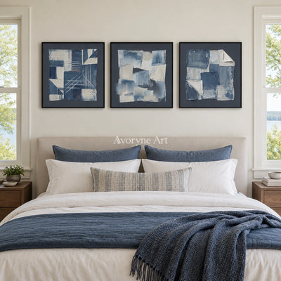 Mineral Horizon blue geometric texture triptych with a black frame above a bed in a bedroom