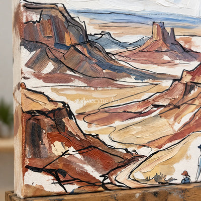 Close-up of the hand-painted texture of Silver Verse canyon landscape wall art on an easel