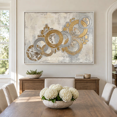 Soft Gesture circle relief wall art with a white frame in a dining room