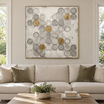 Soft Mosaic circle relief wall art with a gold frame hanging in a living room