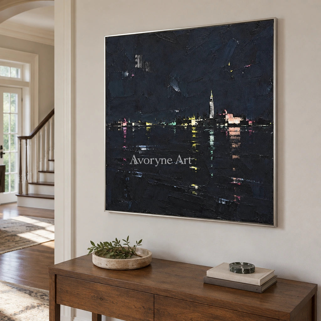 Still Trace cityscape wall art with a silver frame in an entryway
