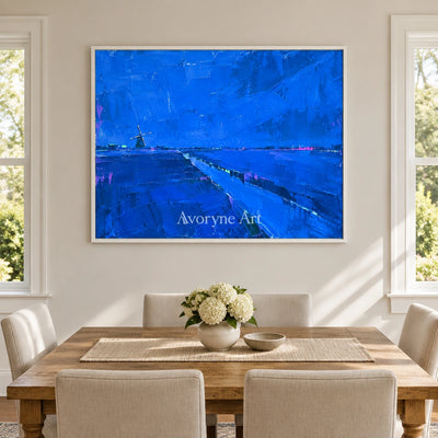 Tender Verse cityscape wall art with a white frame in a dining room