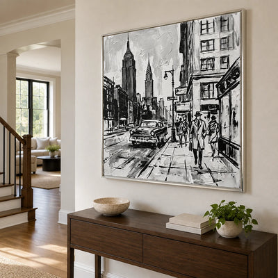 Silver Echo cityscape wall art with a silver frame in an entryway