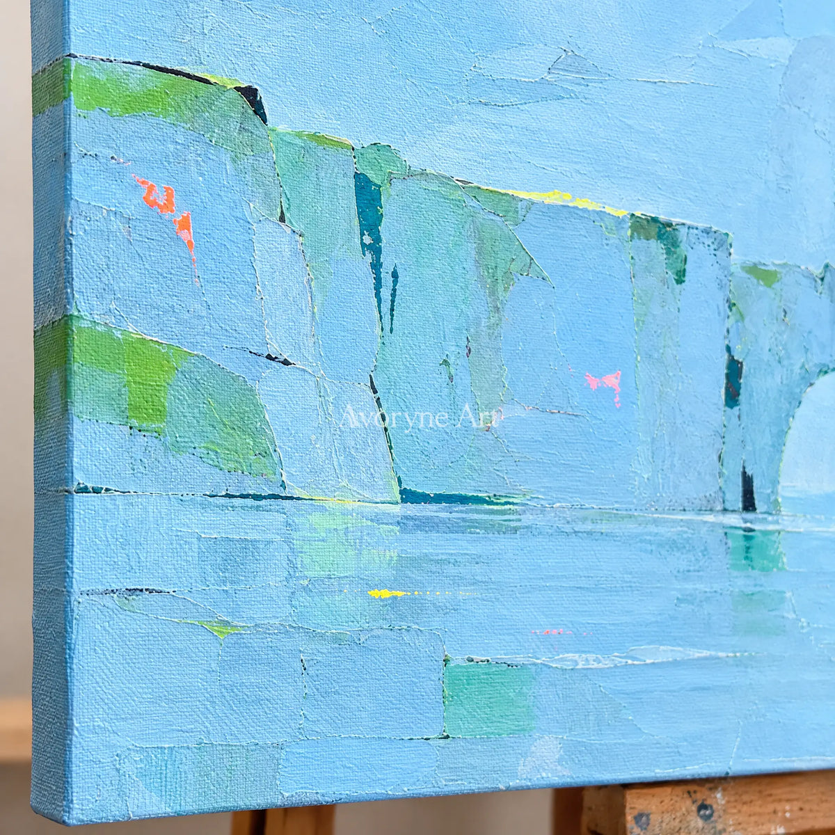 Close-up of the hand-painted texture of Tender Drift coastal landscape wall art on an easel