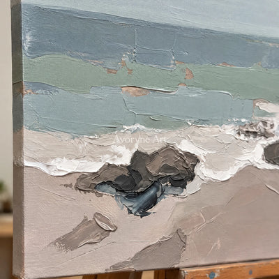 Close-up of the hand-painted texture of Restful Echo coastal landscape wall art on an easel