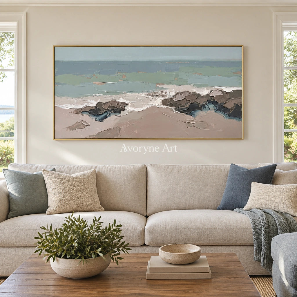 Restful Echo coastal landscape wall art with a gold frame hanging in a living room
