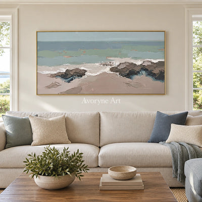 Restful Echo coastal landscape wall art with a gold frame hanging in a living room