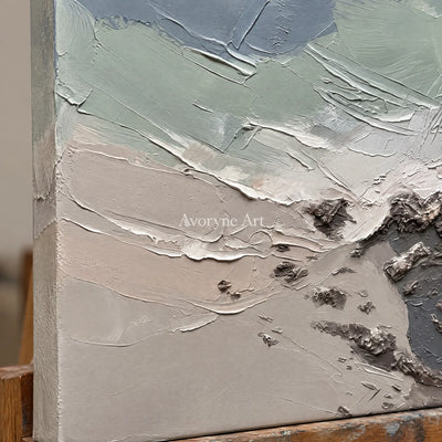Close-up of the hand-painted texture of Restful Gesture coastal landscape wall art on an easel