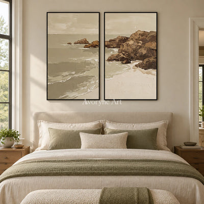 Restful Interval coastal landscape diptych with a black frame above a bed in a bedroom