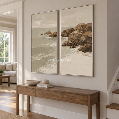 Restful Interval coastal landscape diptych with a silver frame in an entryway