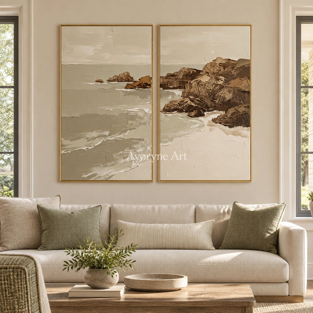 Restful Interval coastal landscape diptych with a gold frame hanging in a living room