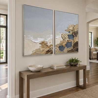Restful Drift coastal landscape diptych with a silver frame in an entryway