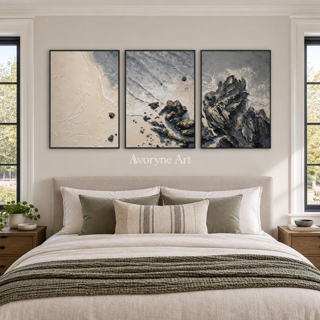 Restful Mosaic coastal landscape triptych with a black frame above a bed in a bedroom