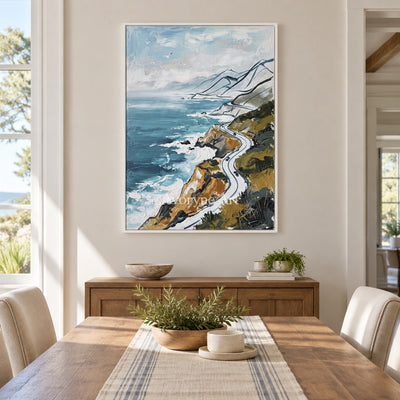 Silver Mosaic coastal road wall art with a white frame in a dining room