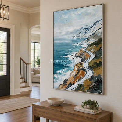 Silver Mosaic coastal road wall art with a silver frame in an entryway