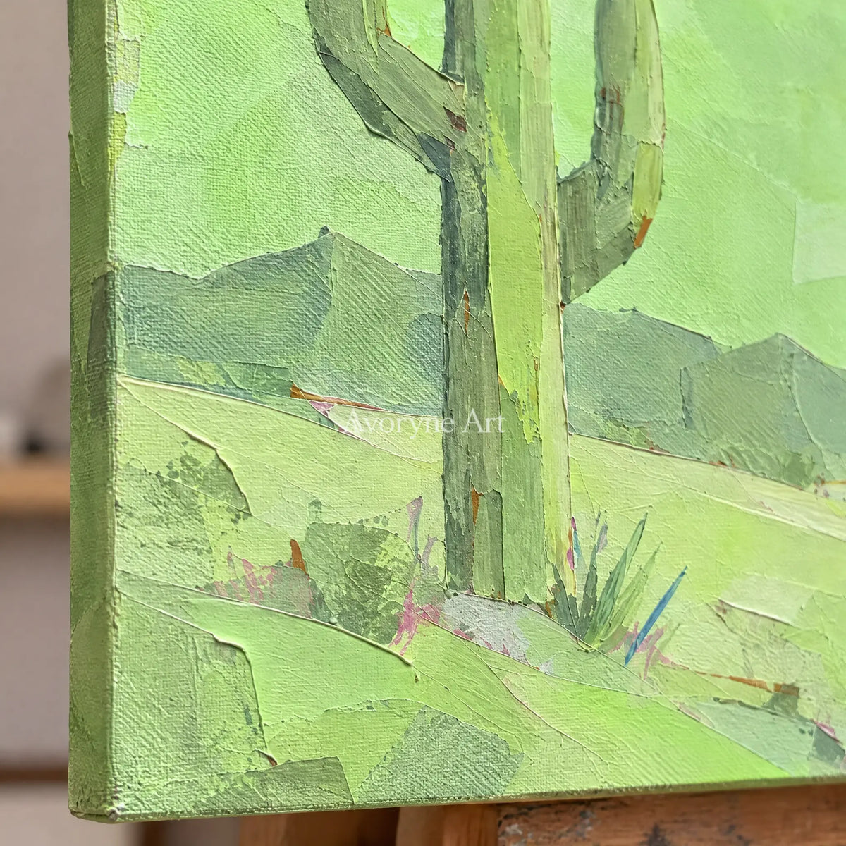 Close-up of the hand-painted texture of Still Passage color block landscape wall art on an easel