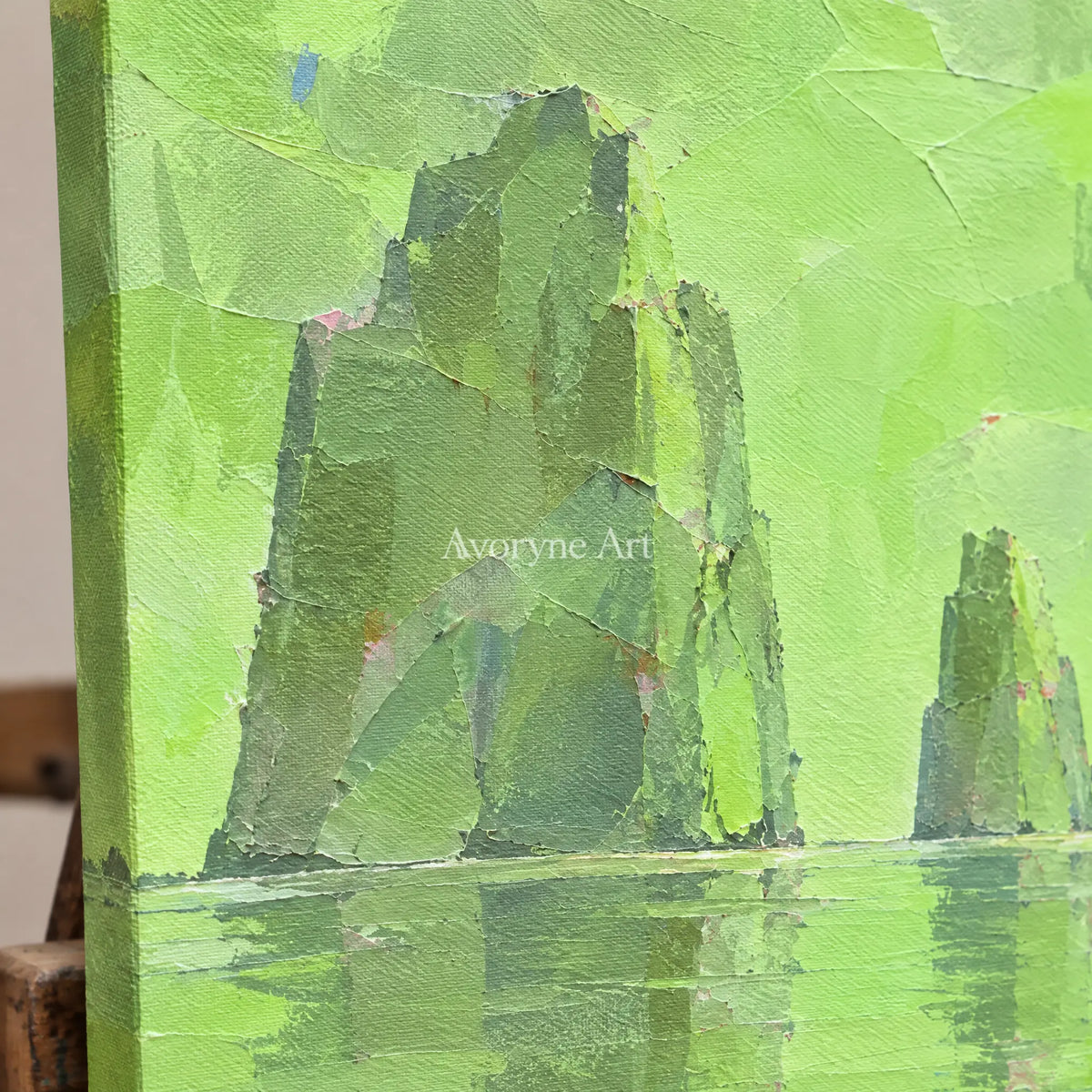 Close-up of the hand-painted texture of Still Reverie color block landscape wall art on an easel