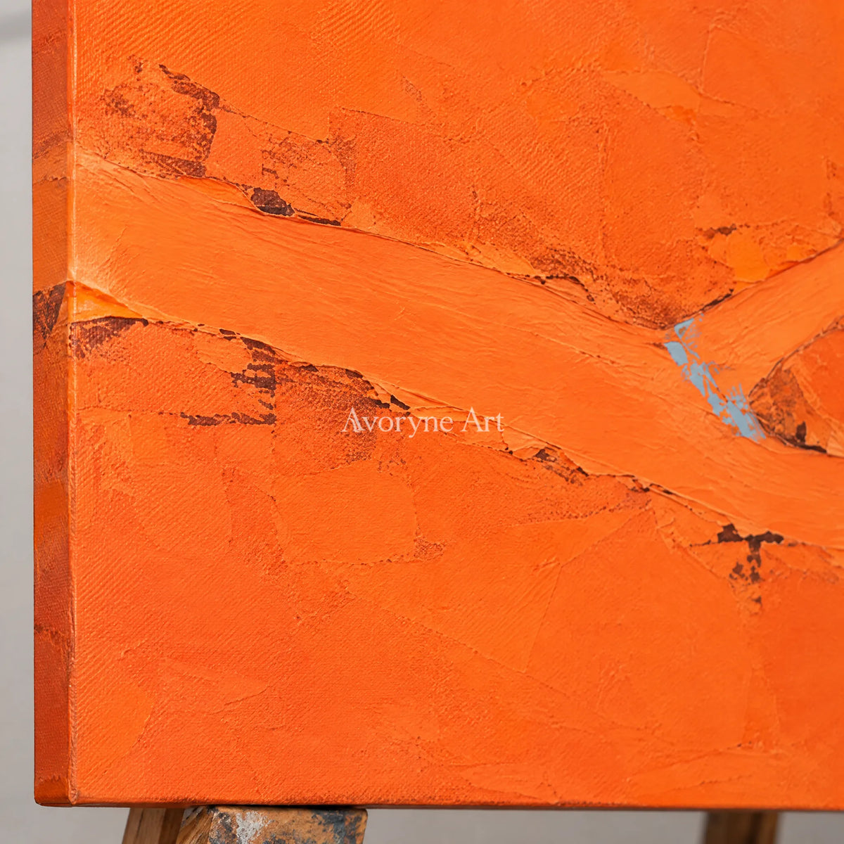 Close-up of the hand-painted texture of Still Echo color block landscape wall art on an easel