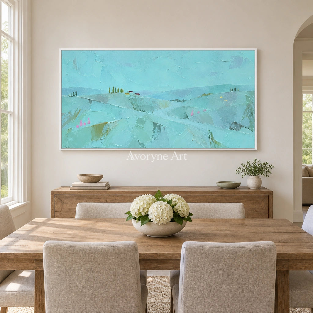 Still Story color block landscape wall art with a white frame in a dining room