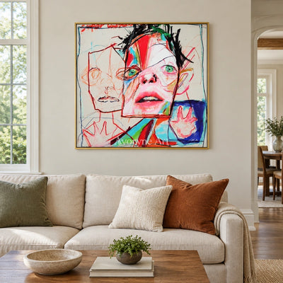 Restful Passage colorful figure wall art with a gold frame hanging in a living room