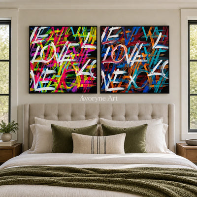 Hidden Prelude colorful love diptych with a black frame above a bed in a bedroom