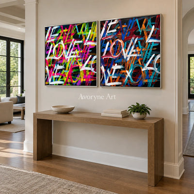Hidden Prelude colorful love diptych with a silver frame in an entryway