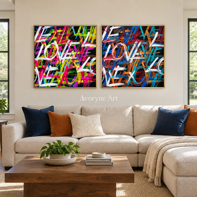 Hidden Prelude colorful love diptych with a gold frame hanging in a living room