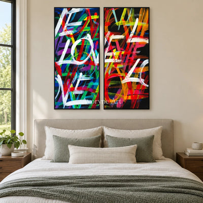 Hidden Trace colorful love diptych with a black frame above a bed in a bedroom